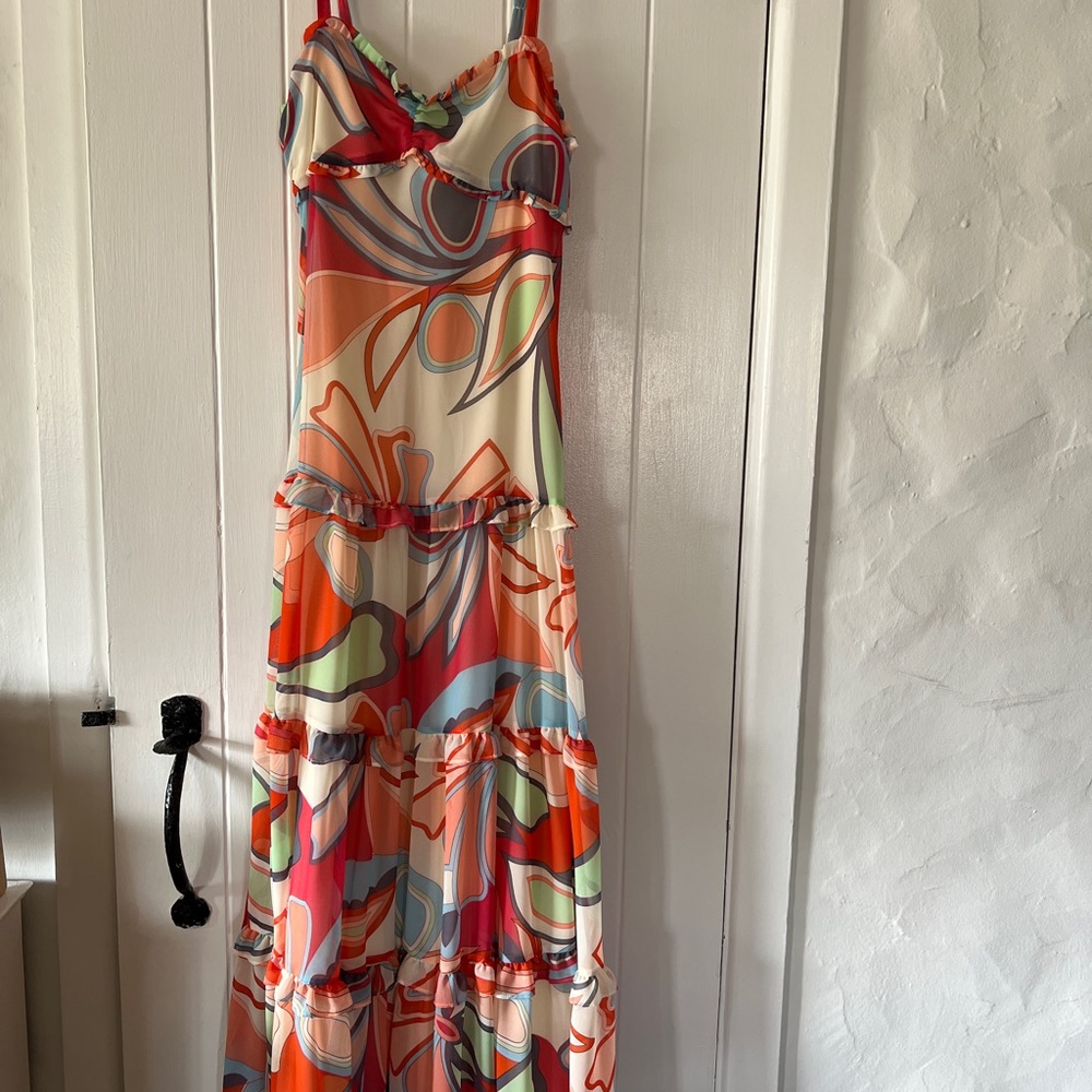 Never been worn - beautiful and colorful maxi dress with tag still on.